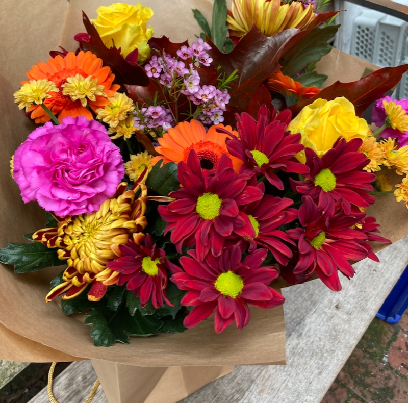 Autumn florists choice hand tied bouquet