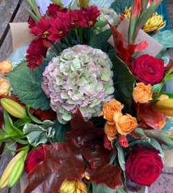 Autumn florists choice hand tied bouquet